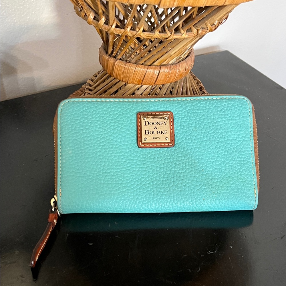 Dooney & Bourke Pebble Grain Zip Around Wallet in the color Spearmint